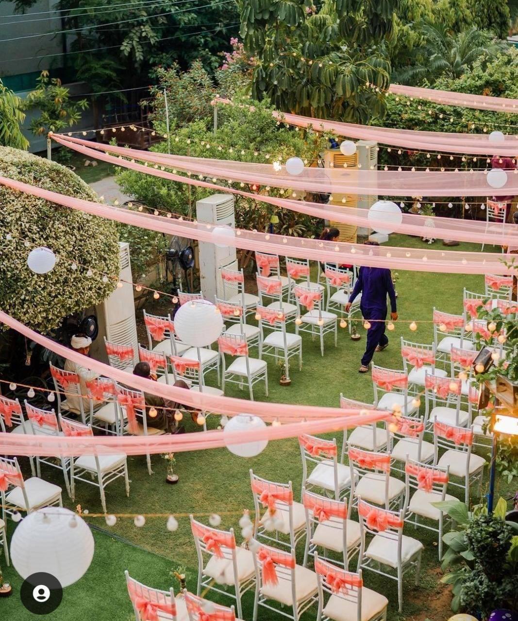 luxury pink floral chandelier and red carpet walkway for a wedding reception by Alvi Events & Catering in Lahore (46)